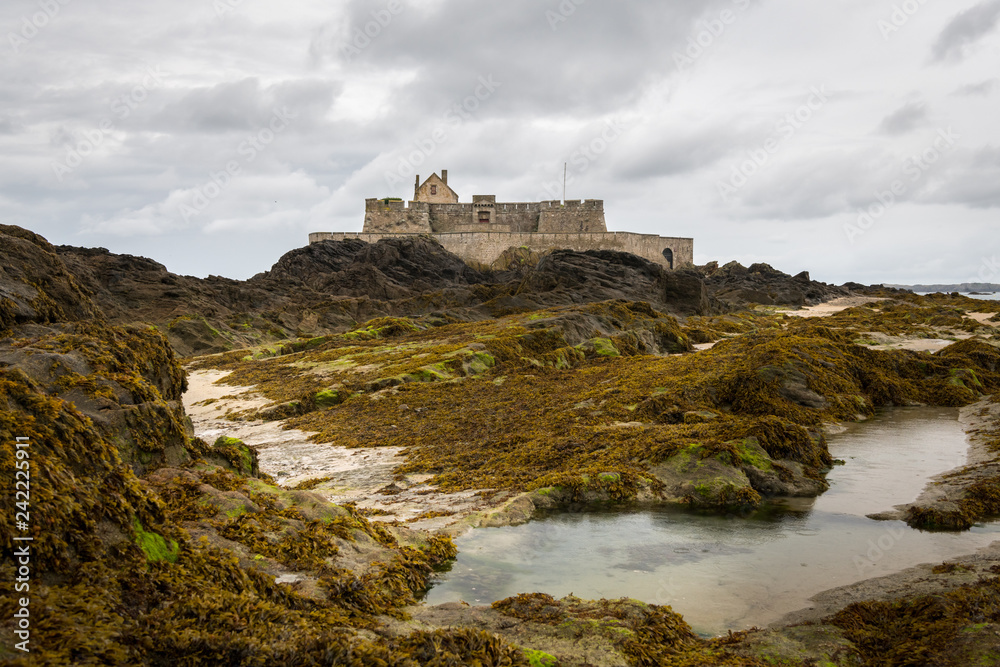 The beach and Fort National during low tide in Saint Malo