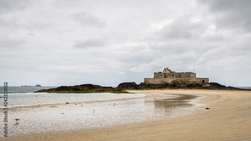 The beach and Fort National during low tide in Saint Malo