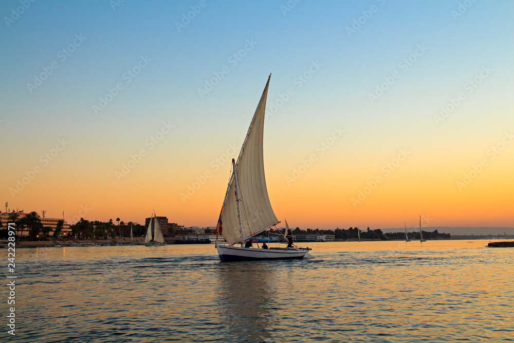 Sailboat at sunset in the Nile, Egypt