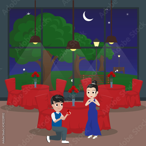 A male kneeling to Give a Gift in Restaurant