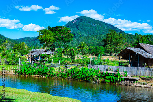 Small canal with mountain in Mueang Khong district photo