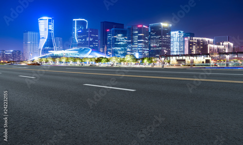 Road Pavement and Night View of Hangzhou Urban Architecture..