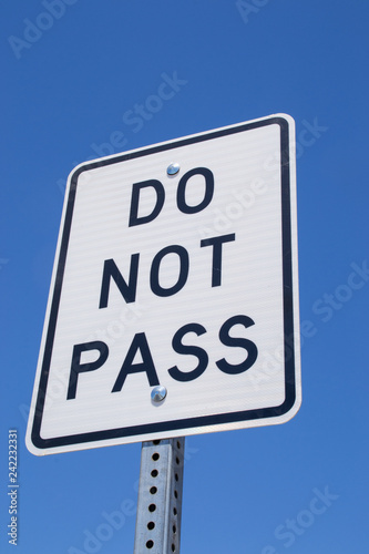 The "Do not pass" sign with California blue skies in the background. 