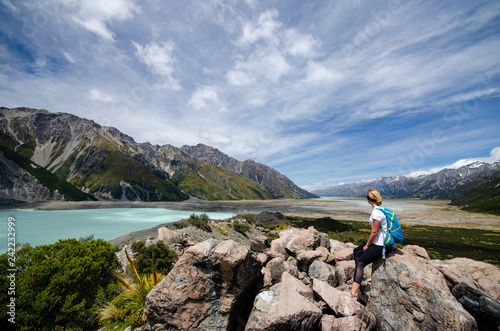 Woman tourist watching Tasman lake, New Zealand © Martin
