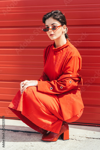 fashionable girl in red monochrome
