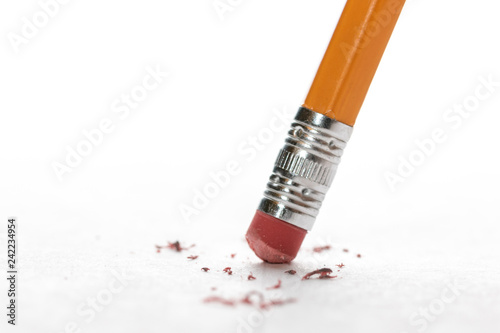Pencil erasing mistake made on white paper