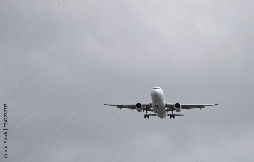 Fototapeta premium airplane in the sky while takeoff ,landing