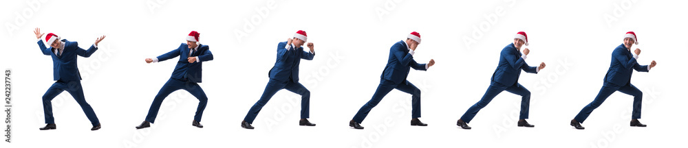 Young busnessman wearing santa hat in christmas concept on white Young busnessman wearing santa hat in christmas concept on white