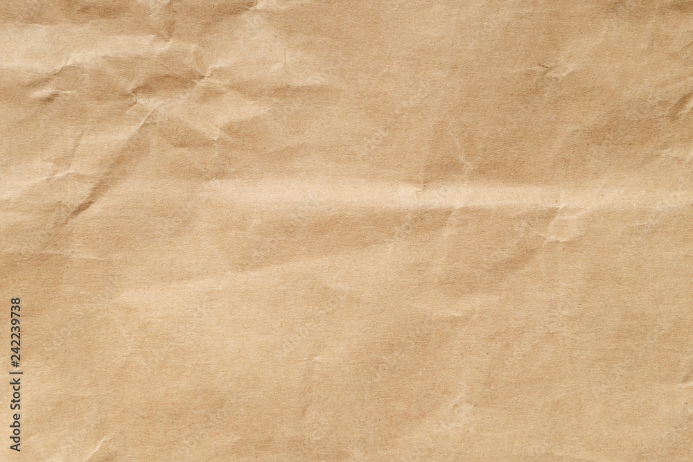 Brown crumpled paper texture for background.