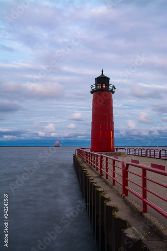 The "Milwaukee Pier Head Lighthouse" as the sun sets and the rain passes. Milwaukee, Wisconsin, USA