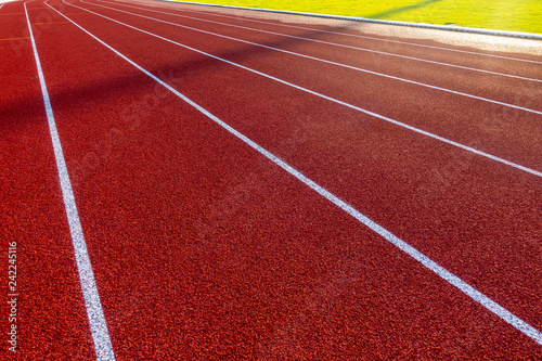 Red running track in stadium