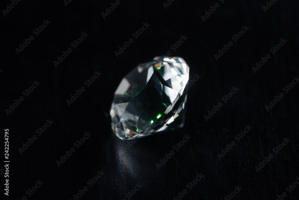 clear big diamond on black background clear big diamond on black background