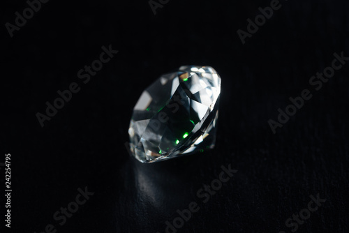 clear big diamond on black background