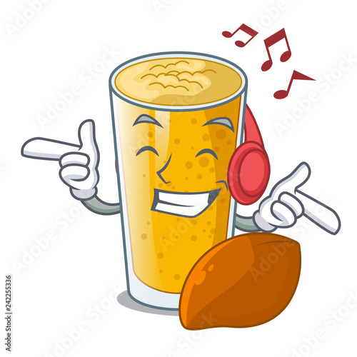 Listening music lassi mango on the mascot table