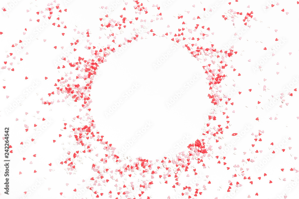 Obraz premium Circle border frame made of colorful hearts on a white background