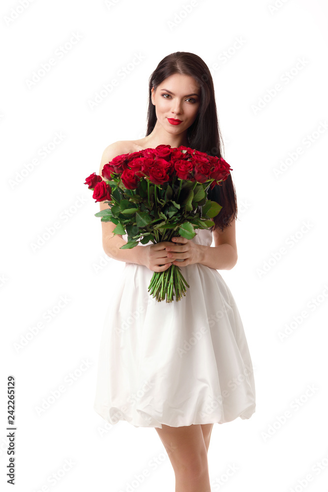 beautiful young woman with a large bouquet of red roses beautiful young woman with a large bouquet of red roses