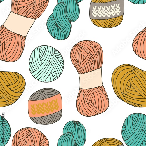 Knitting yarn balls seamless pattern in hand drawn style
