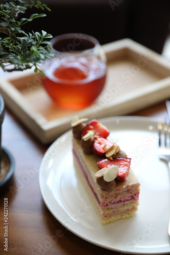 Strawberry cake dessert sweet food with strawberry nuts amd cake on wooden table