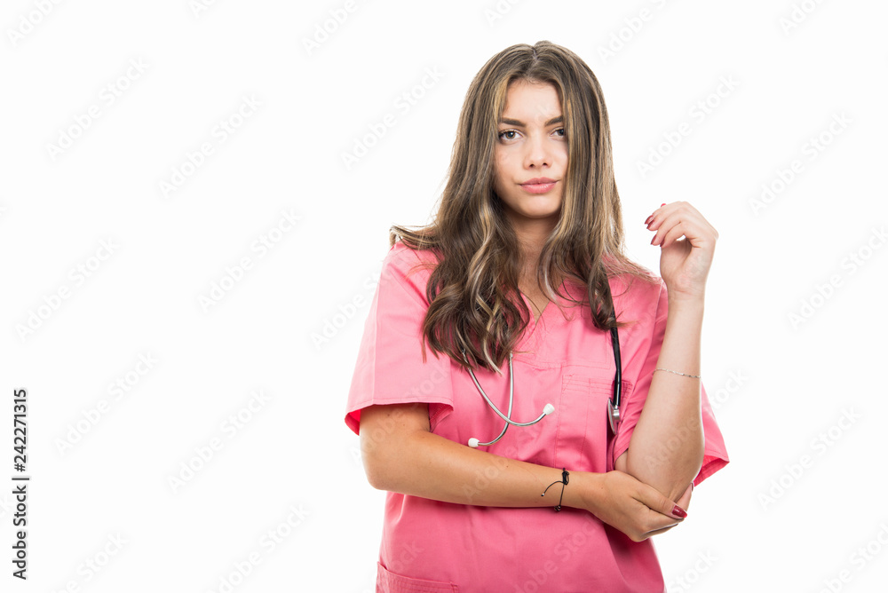 Portrait of beautiful young doctor holding elbow like hurting Portrait of beautiful young doctor holding elbow like hurting