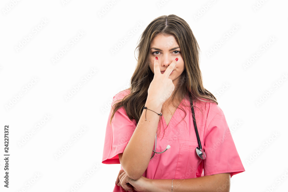 Portrait of beautiful young doctor making look into my eyes Portrait of beautiful young doctor making look into my eyes