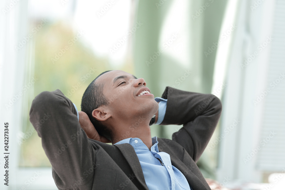 dreaming of a businessman sitting at his Desk dreaming of a businessman sitting at his Desk
