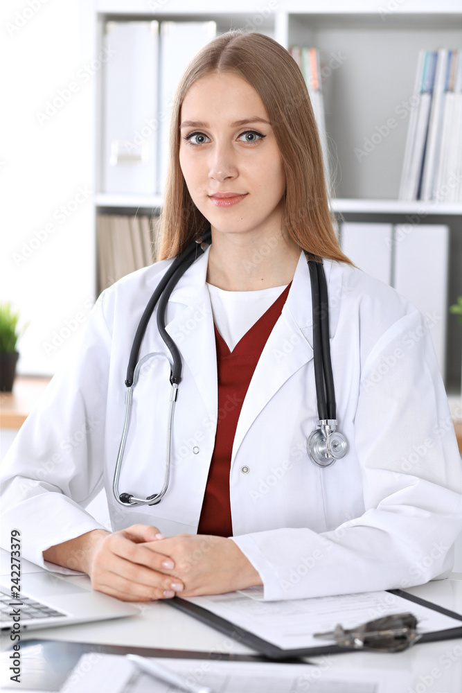 Close-up of a unknown female doctor's hands. Physician at working place ready to consult and halp patients. Medicine concept Close-up of a unknown female doctor's hands. Physician at working place ready to consult and halp patients. Medicine concept
