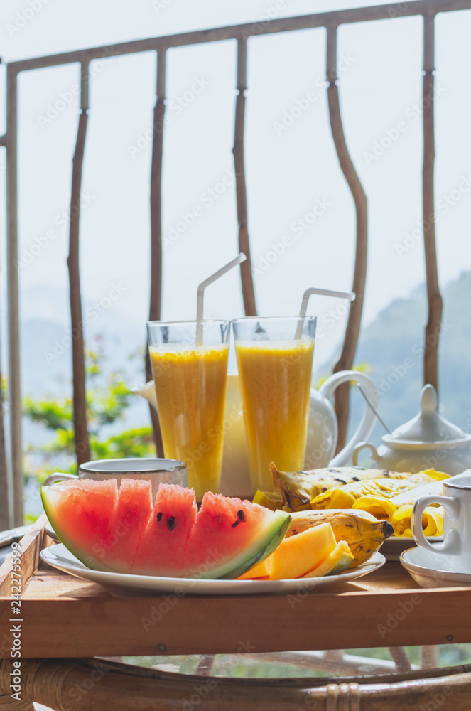 Fototapeta premium Beautifully served breakfast on terrace or balcony