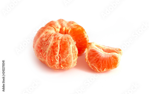 Unpeeled mandarin, isolated on white background