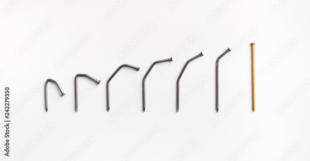 Straight golden nail with row of bent ones Straight golden nail with row of bent ones