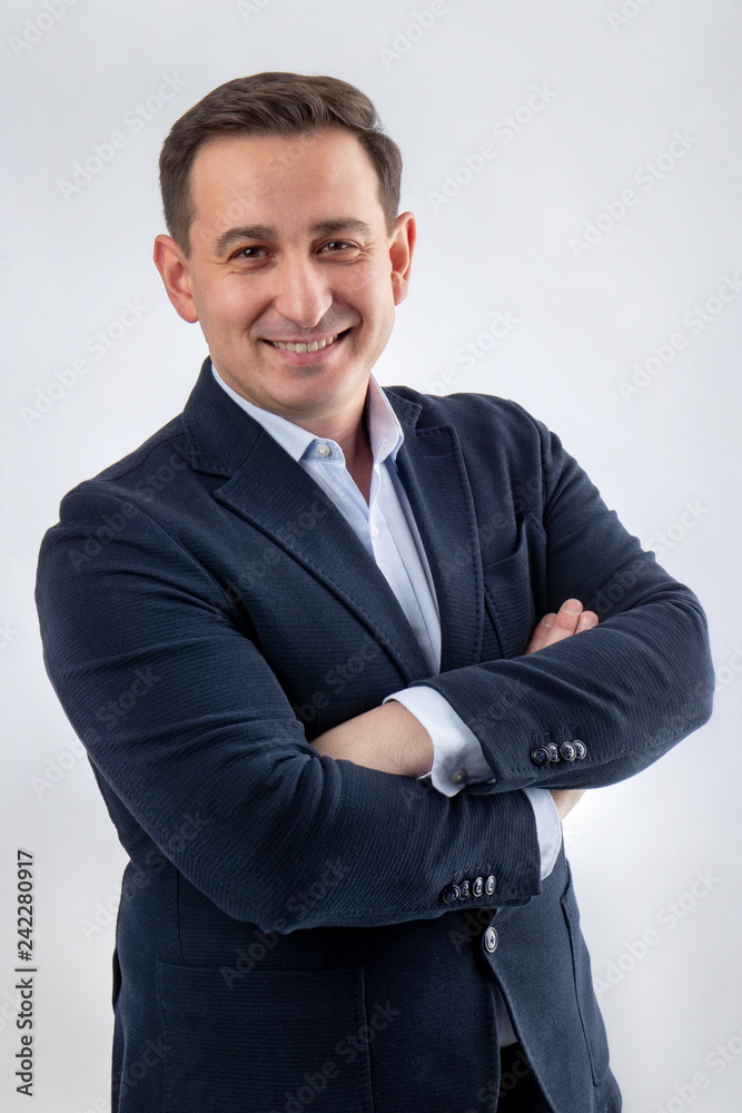 Fototapeta premium Portrait of a handsome business man smiling
