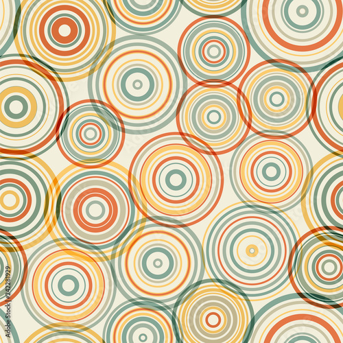 Abstract colored wallpaper with scattered concentric rings. Random order of circles. Calm vintage colors.