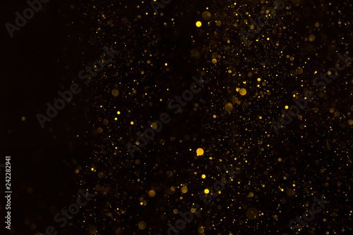 Golden dust sparkling glitter background