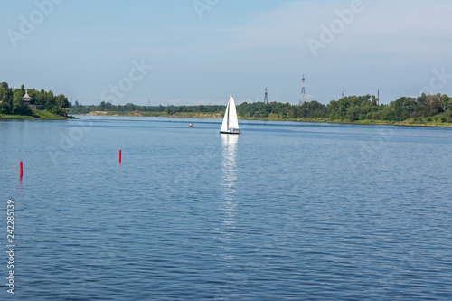 Boat with sail on the Volga river
