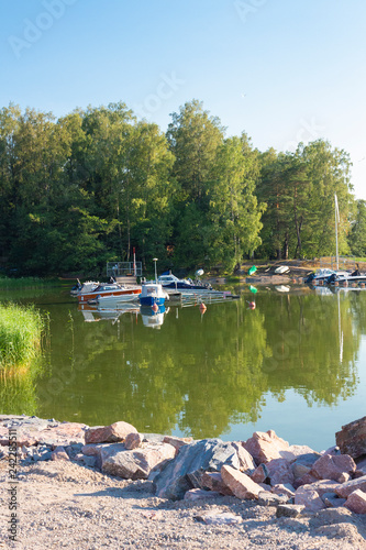 Yachts in the Gulf of Finland in the city of Helsinki near the metro station Koivusaaren metro station on a summer day.