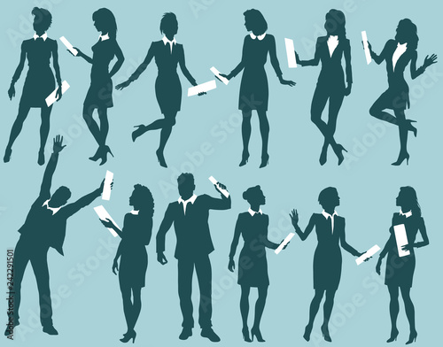 Silhouettes of business people with documents
