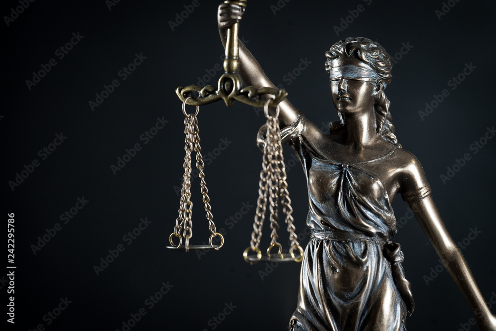  Goddess of justice on a beautiful black background. the subject of law