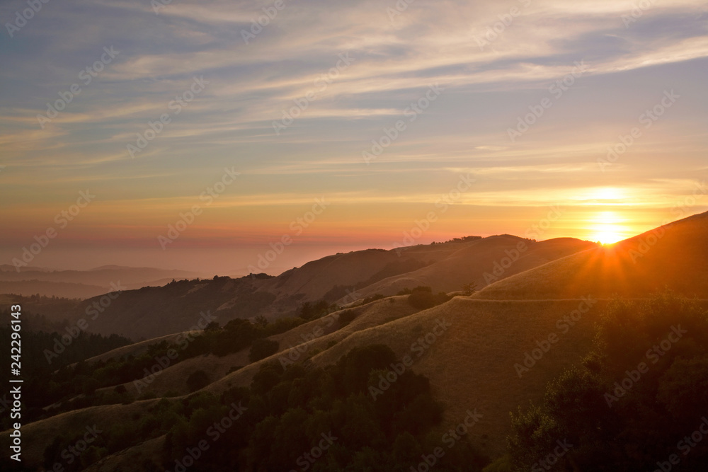 Sunset over California Mountains and Pacific Ocean