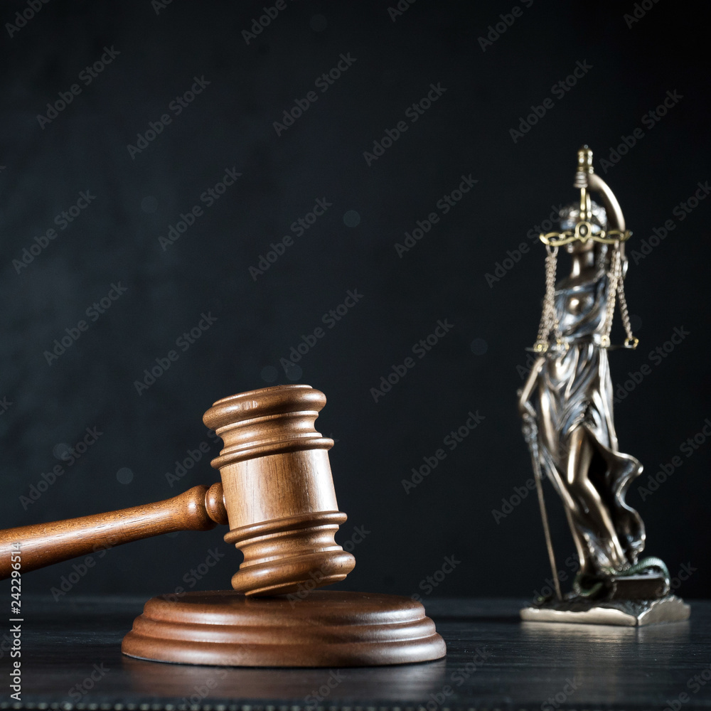 Goddess of justice on a beautiful black background. the subject of law Goddess of justice on a beautiful black background. the subject of law