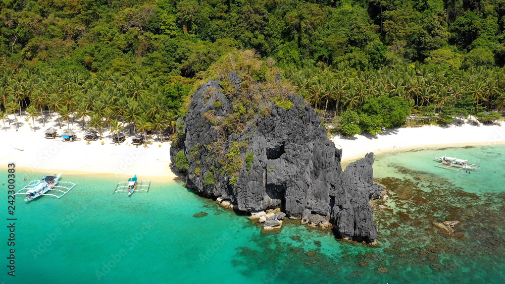 boat in a lagoon in aerial view, El Nido Philippines	