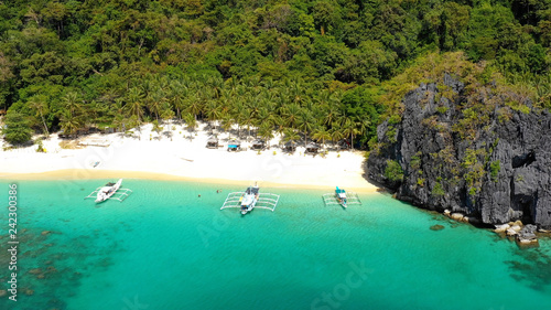 boat in a lagoon in aerial view, El Nido Philippines 
