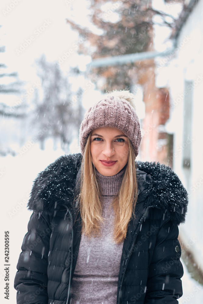 Portrait of beautiful woman in snowy day. Portrait of beautiful woman in snowy day.