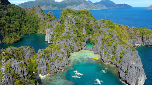 canoe in lagoon in aerial view in philippines