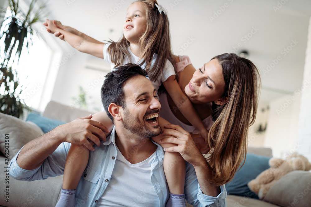 © NDABCREATIVITY - Happy family having fun time at home © NDABCREATIVITY - Happy family having fun time at home