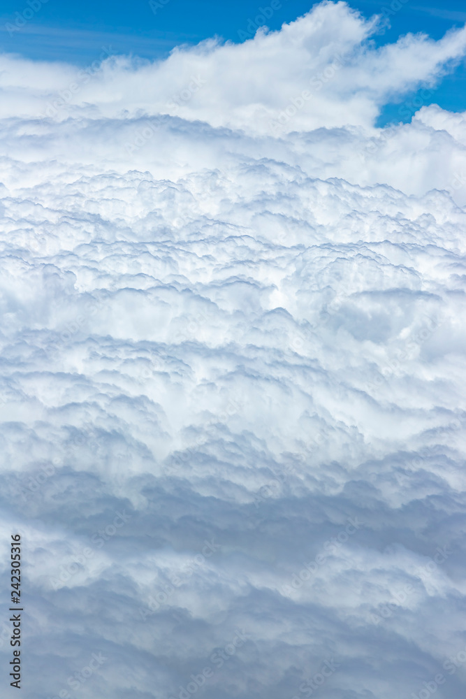 Flying above a dense layer of white clouds. Great and beautiful clouds. Flying above a dense layer of white clouds. Great and beautiful clouds.