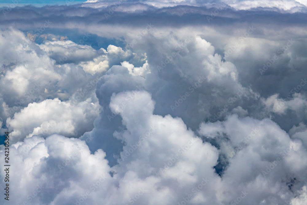 Flying above a dense layer of white clouds. Great and beautiful clouds. Flying above a dense layer of white clouds. Great and beautiful clouds.