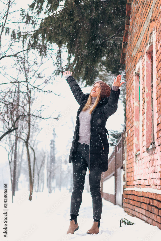 Enjoying snow falling.