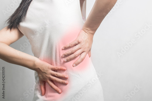 Wallpaper Mural woman have waist ache and pain Torontodigital.ca