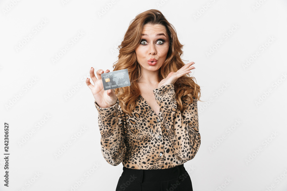 Beautiful cheerful young woman wearing leopard blouse Beautiful cheerful young woman wearing leopard blouse