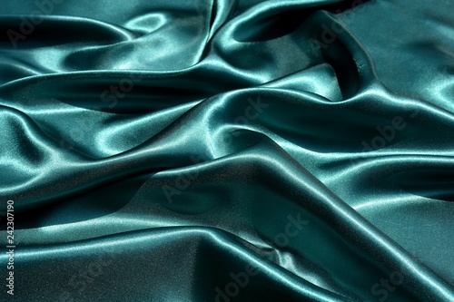 Emerald wavy silk background texture