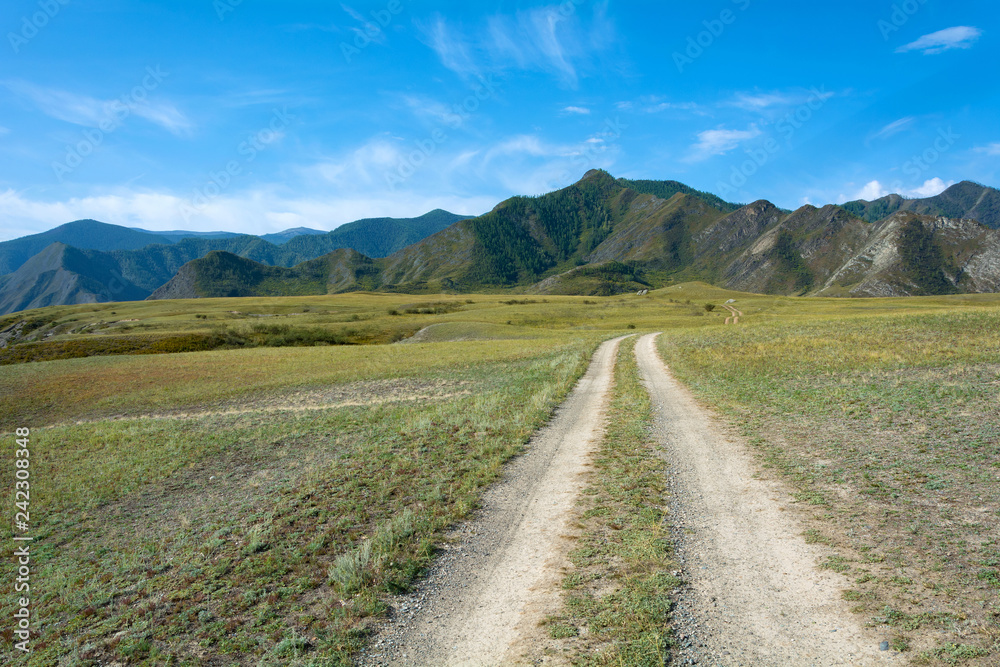 Dirt road in the Altai mountains Dirt road in the Altai mountains